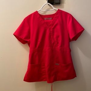 Light red Greys Anatomy scrubs. Gently worn.
